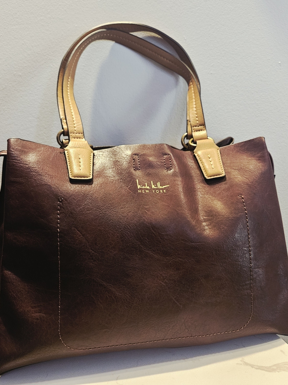 Nicole Miller Merlot Leather Hand bag Tote with Tan Handles & Zip Closure